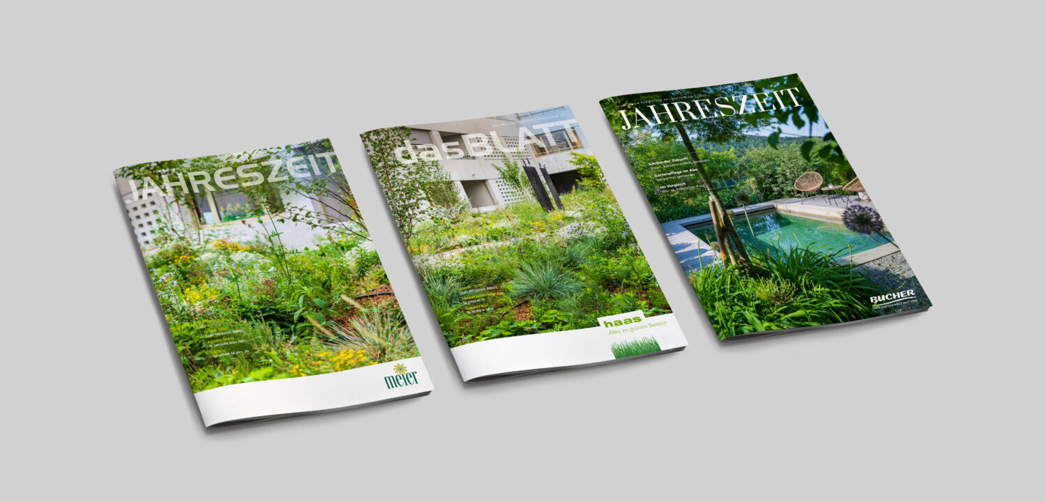 Jeder Partner der Gartenallianz bekommt ein Magazin in seinem eigenen Branding. Drei Gartenmagazine nebeneinander.